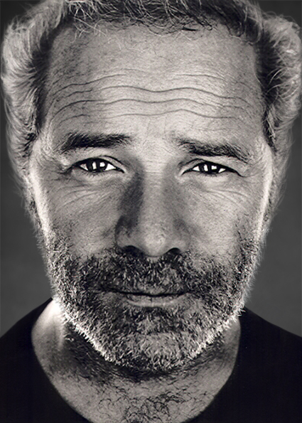 Black and white headshot of actor Peter Mullan