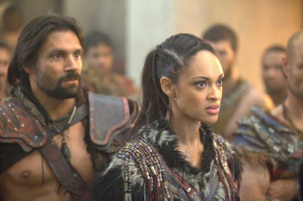 Cynthia Addai-Robinson and Manu Bennett in Spartacus