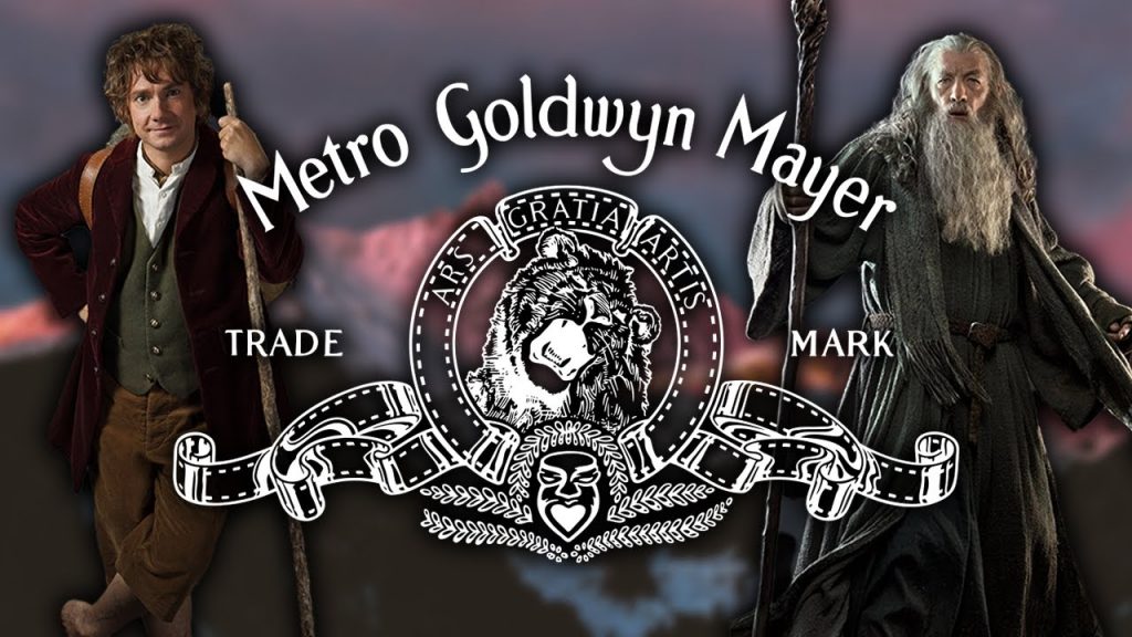 MGM's famous roaring lion trade mark is seen in front of Bilbo and Gandalf.