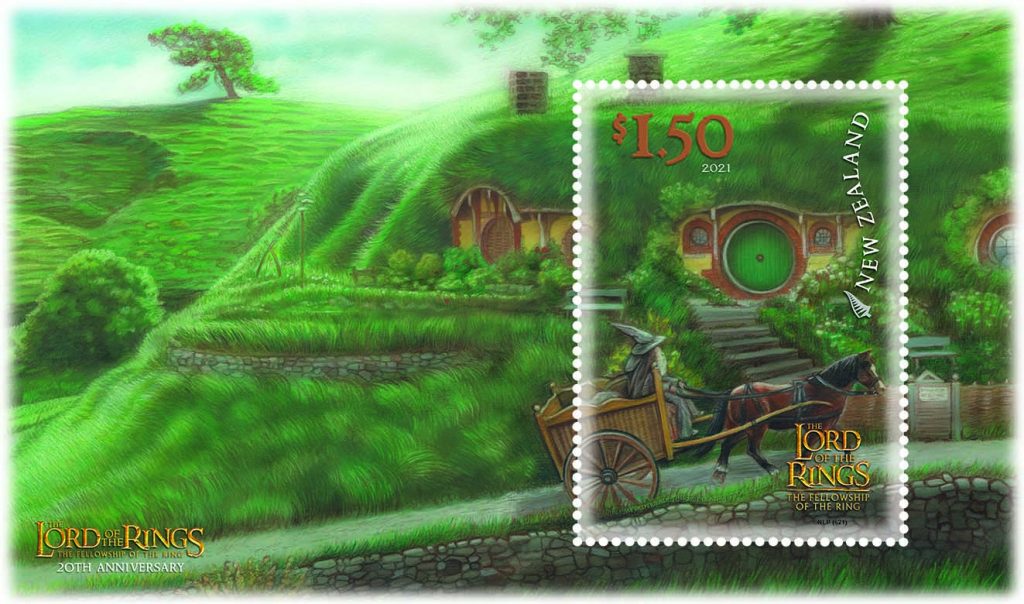 $1.50 stamp, showing an illustration of Gandalf in his cart, pulling up to the gate of Bag End - against a backdrop of a lush, green Hobbiton.