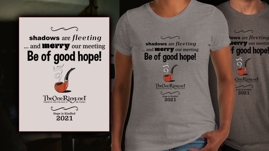 TORn's design, featuring quotations from Tolkien: 'Shadows are fleeing ... and merry our meeting. Be of good hope!' We see an image of a smoking pipe, and TORn's logo below. The bottom of the design features another quotation - 'Hope is Kindled' - and the date, 2021. The design is show on a pale grey t-shirt. 