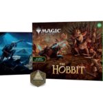 Boxed board game titled 'Magic: The Gathering — The Hobbit' with a green 'BUNDLE' strip and a polyhedral die in front