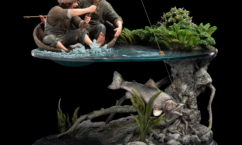 Two men fishing from a wicker boat on a water diorama, with a large fish beneath a rocky underwater habitat.
